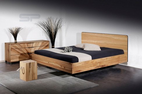 Soleil-sleeping von Sprenger Möbel - Bett mit Sonnenmotiv-Kopfteil