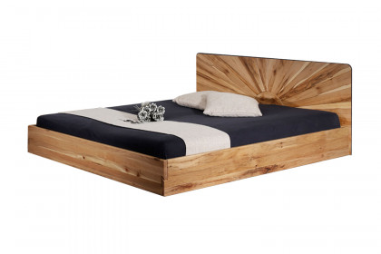 Soleil-sleeping von Sprenger Möbel - Bett mit Sonnenmotiv-Kopfteil