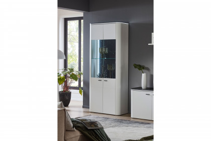 Wave-living von IDEAL Möbel - Vitrine in Weiß mit Oberbodenbeleuchtung