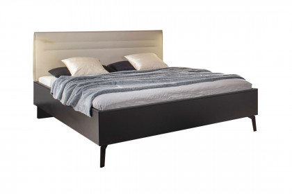 Scale-Sleep von Rauch Black - Bett schwarz mit Polsterkopfteil champagner