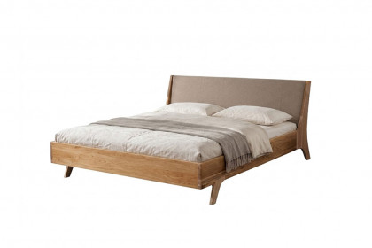 Amina von Sprenger Möbel - Bett mit Stoffkopfteil Sumpfeiche geölt