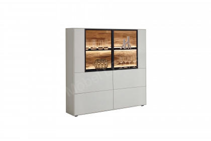 WM 2470 von Wöstmann - Highboard in weißem Lack mit Glasausschnitten