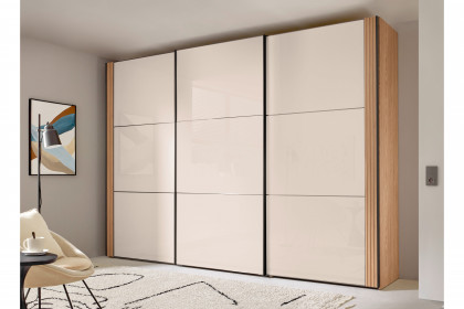 Sinfonie Plus von Staud - Schwebetürenschrank Milano-Eiche/ Elfenbeinglas