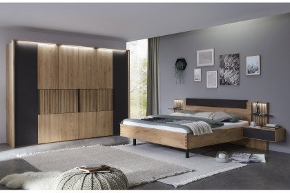 WSM 4400 von Wöstmann - Schlafzimmer mit Beleuchtung und Schrankeinteilung