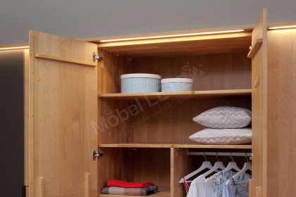WSM 4400 von Wöstmann - Schlafzimmer mit Beleuchtung und Schrankeinteilung