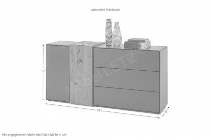 Trevio von Musterring - Wohnwand V26 Kerneiche massiv/ anthrazit/ Glas